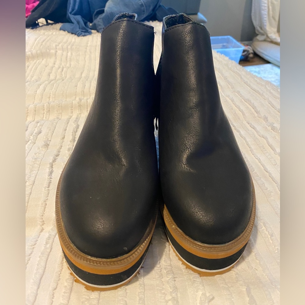 Black ankle booties. Brand new. Never worn